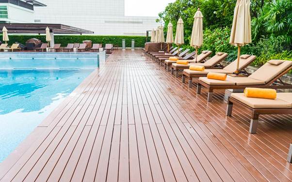 How to Build a Deck Around a Pool Safely and Stylishly